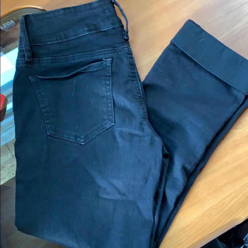 Black cropped skinny jeans